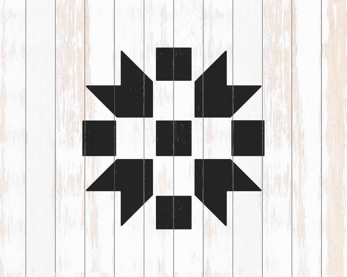 a black and white geometric design composed of various shapes and patterns, including squares, triangles, and other geometric elements, all set against a white wooden background.