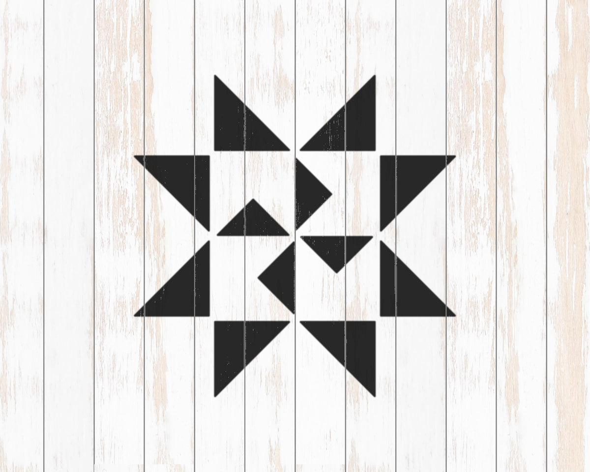 a black and white geometric design composed of various triangular shapes arranged in a symmetrical pattern.