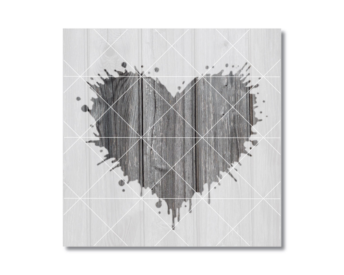 A heart-shaped design made of wooden planks, with splatters of paint or ink around it, creating a striking visual effect.