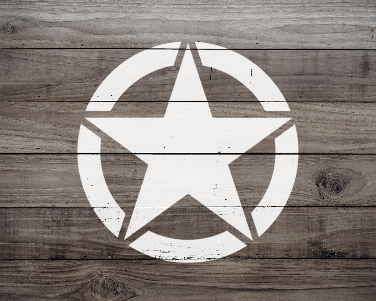 a wooden surface with a white star-shaped symbol painted on it.