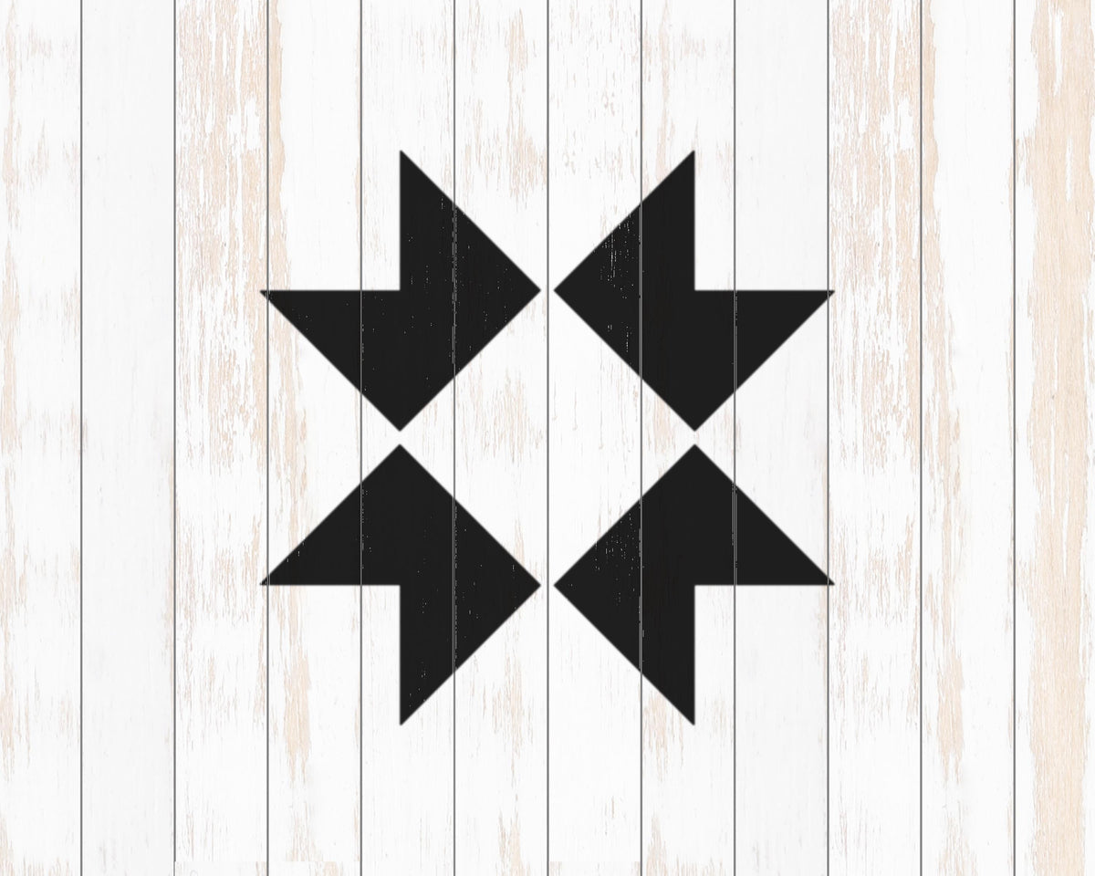a simple, geometric design consisting of four black arrows pointing in different directions, set against a white wooden background.