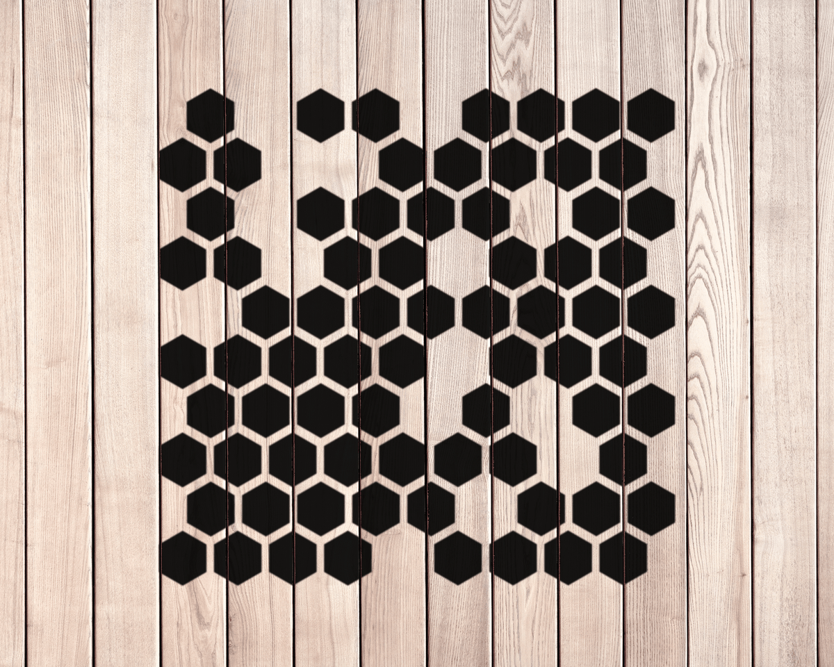 a wooden surface with a repeating pattern of black hexagons.