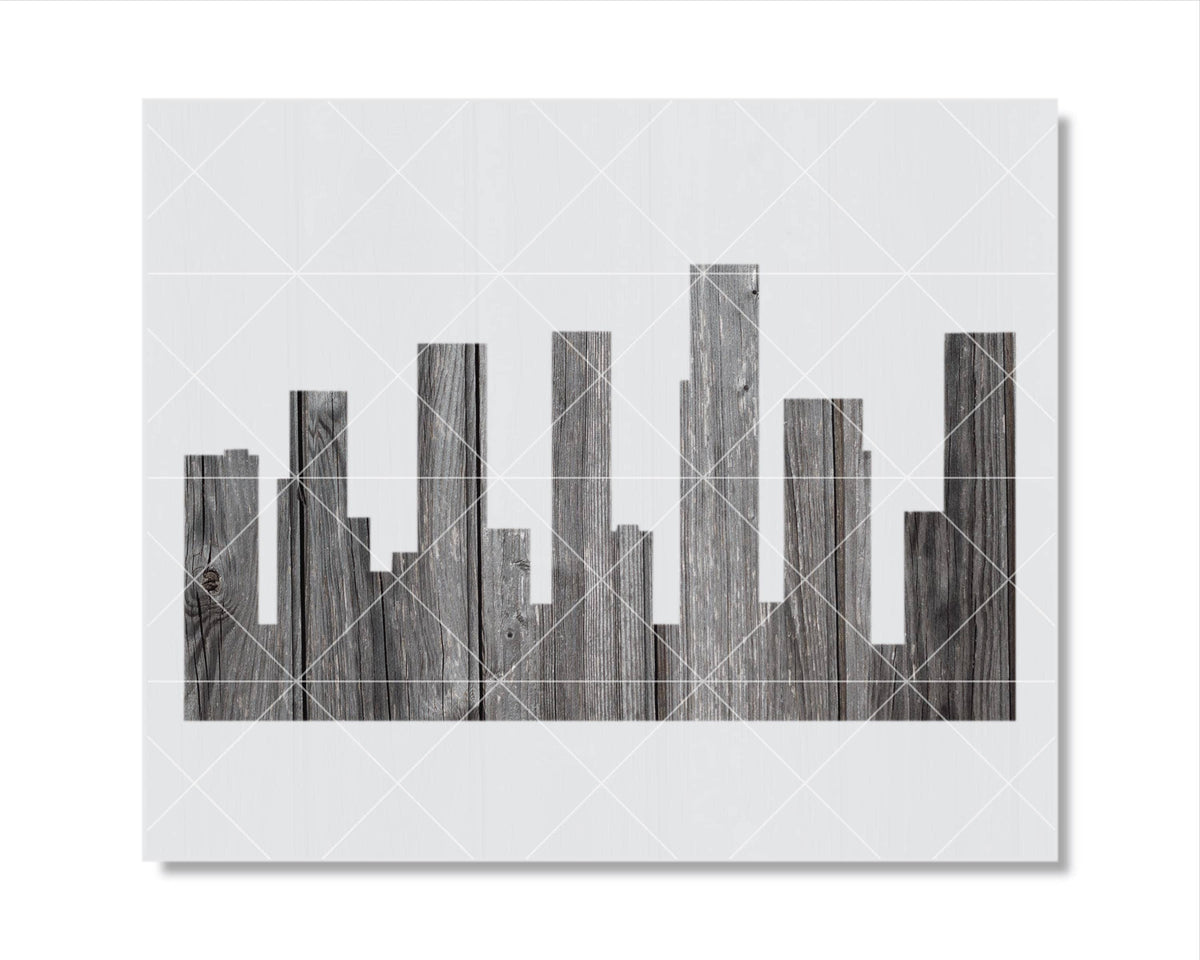 A black and white image depicting a city skyline composed of wooden planks or boards arranged in a grid-like pattern.