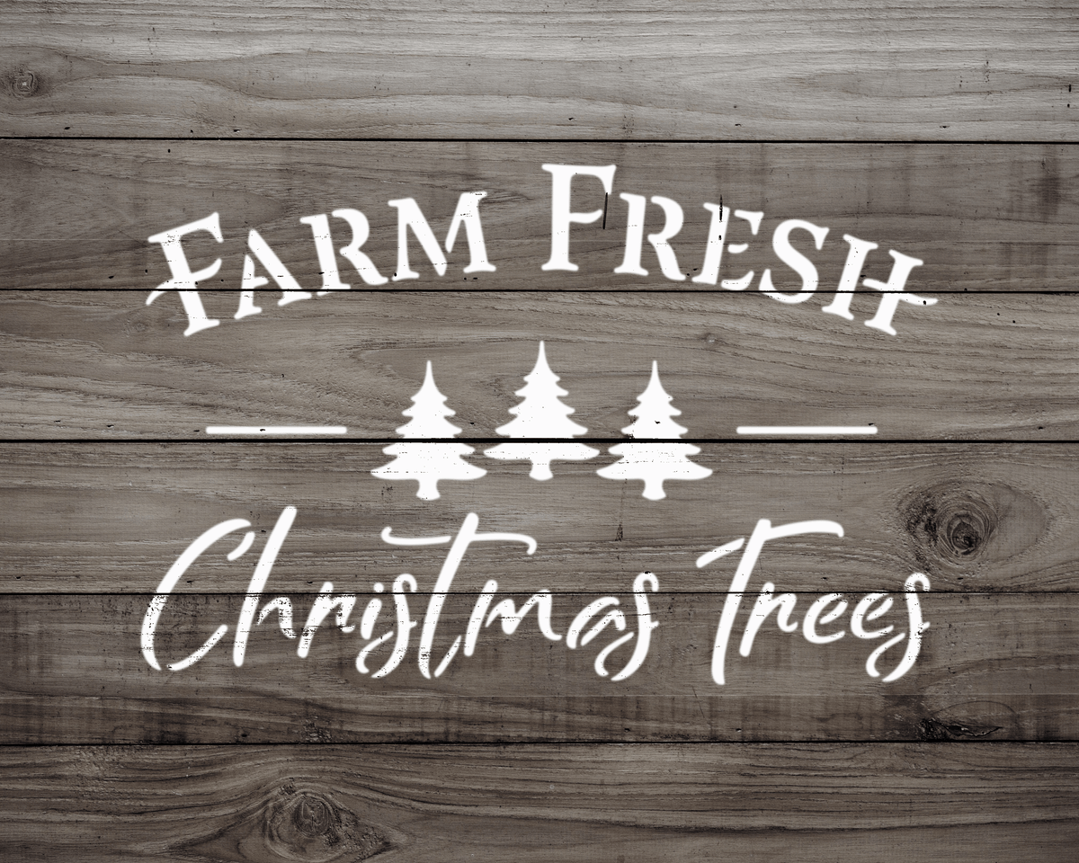 a wooden background with the text "FARM FRESH Christmas Trees" written in a stylized font.