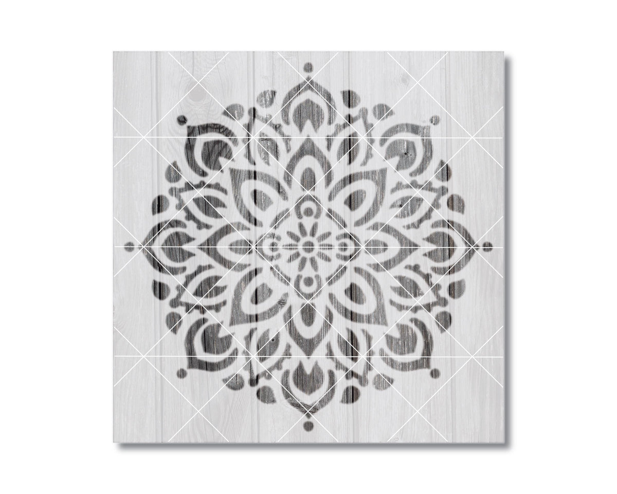 a symmetrical, intricate mandala-like design with a repeating pattern of floral and leaf-like shapes in black and white.