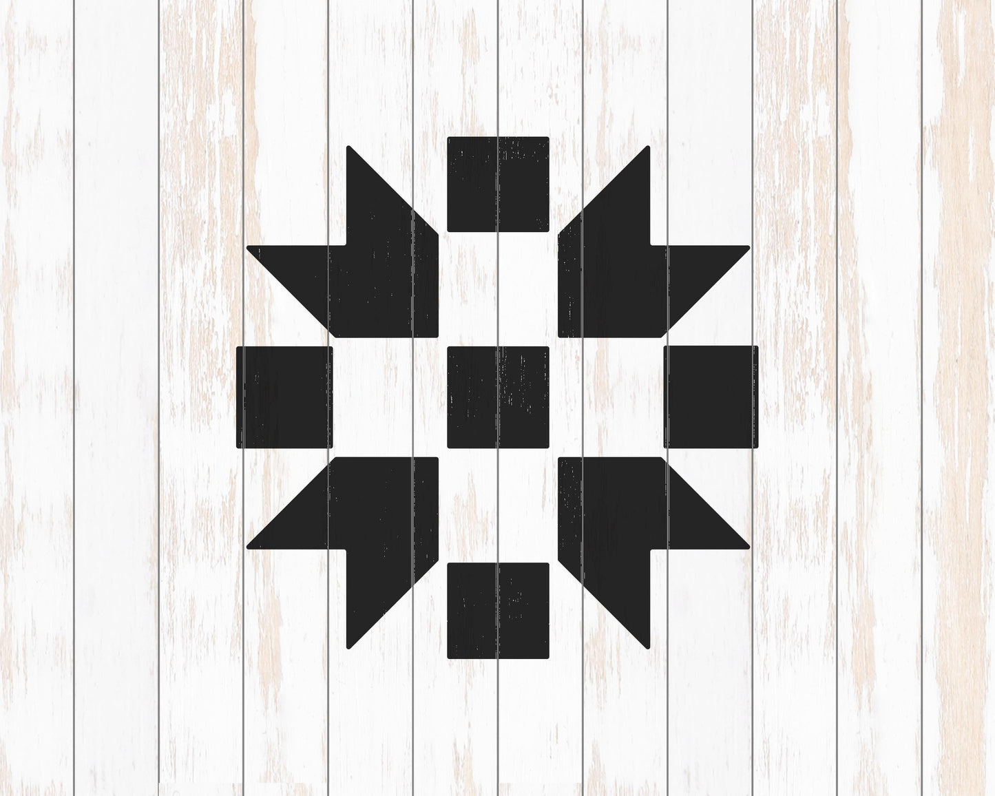 a black and white geometric design composed of various shapes and patterns, including squares, triangles, and other geometric elements, all set against a white wooden background.