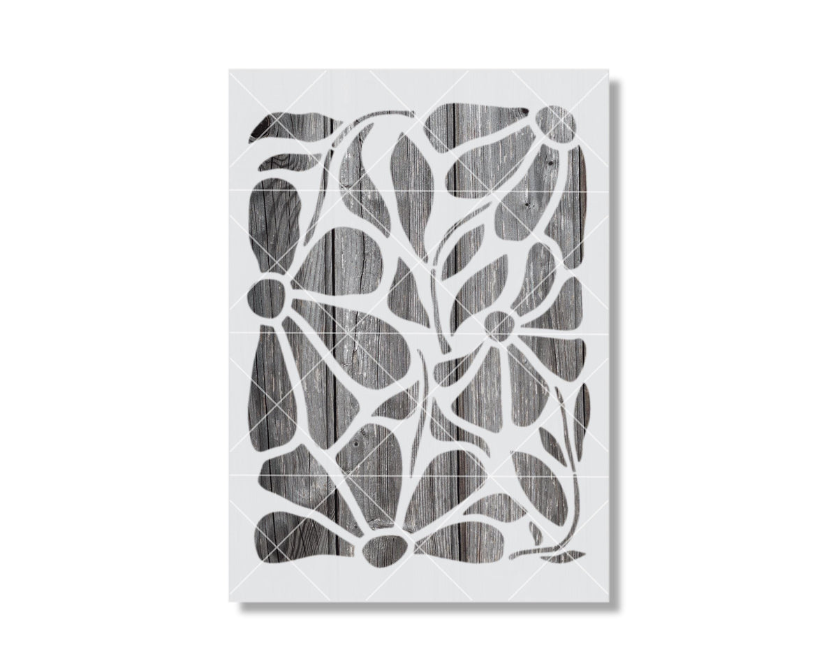 The image is a black and white abstract artwork featuring a pattern of overlapping shapes and lines, creating a visually striking and intricate design.