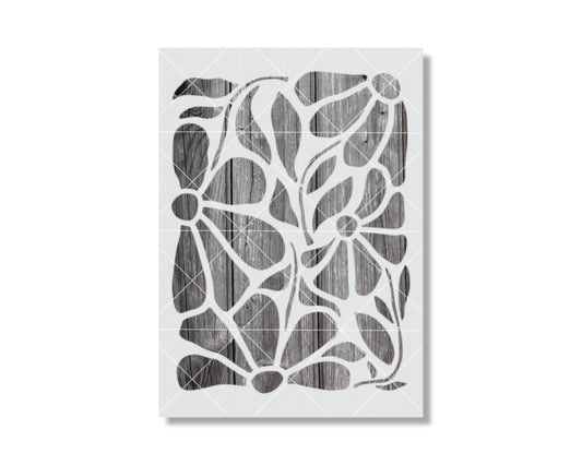 The image is a black and white abstract artwork featuring a pattern of overlapping shapes and lines, creating a visually striking and intricate design.