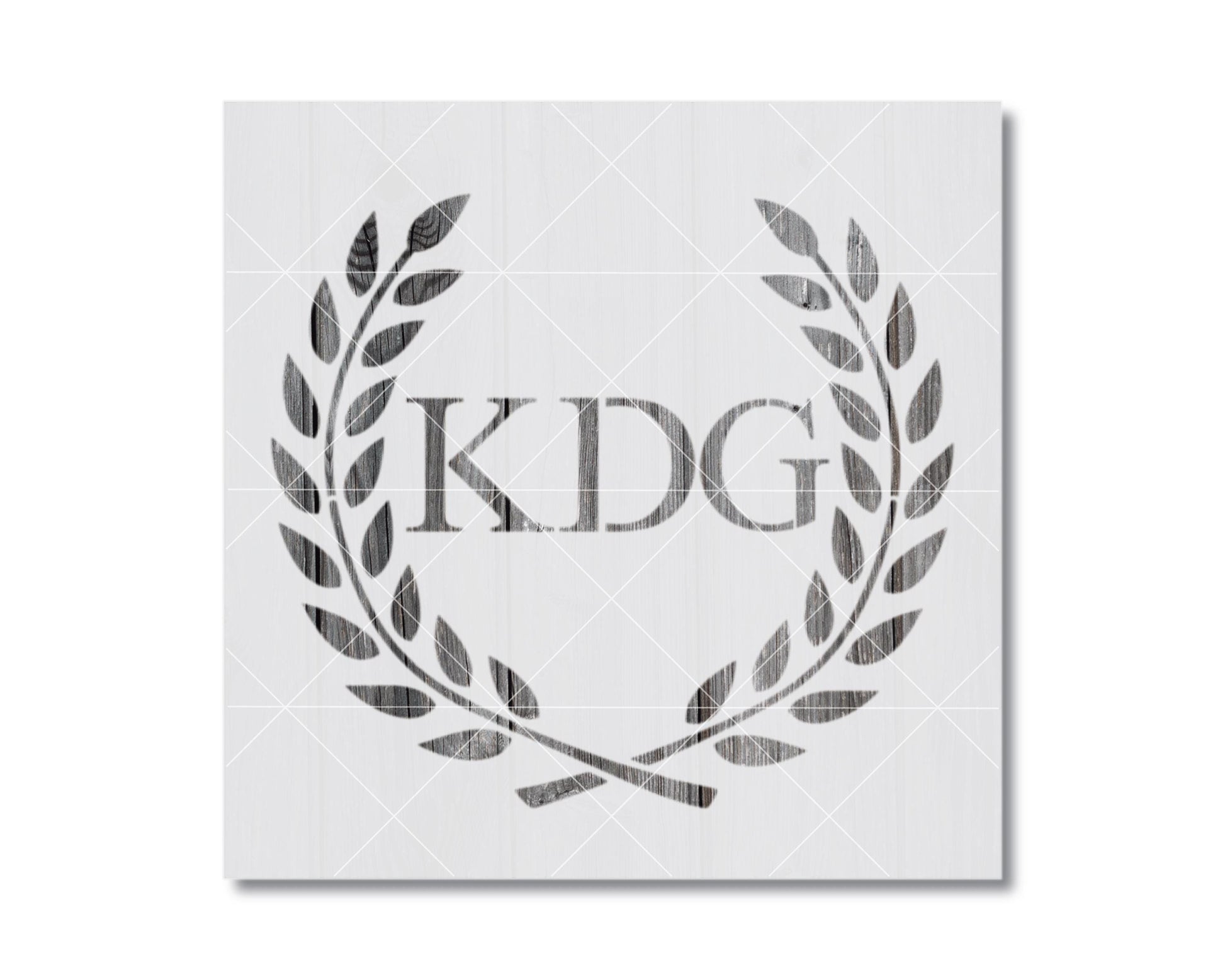 a monogrammed logo with the letters "KDG" prominently displayed in the center.