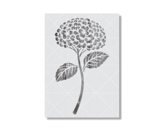 A black and white illustration of a flower with a large central bloom and two smaller leaves.
