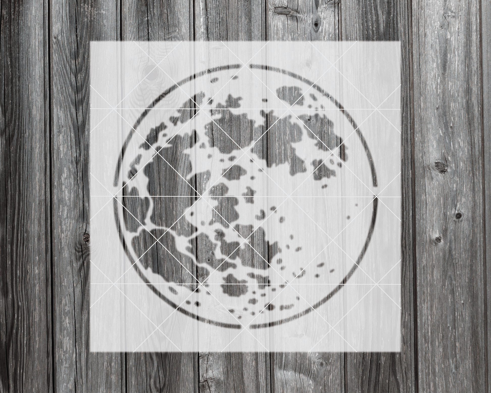 a picture of the earth on a piece of wood
