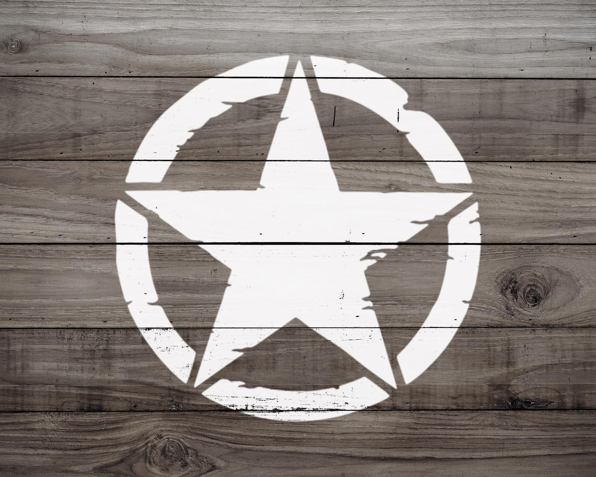 A white star-shaped symbol painted on a wooden background.