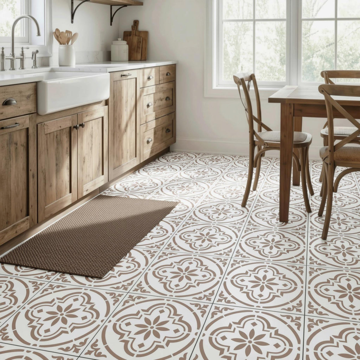 a kitchen with a white sink, wooden cabinets, and a patterned tile floor.