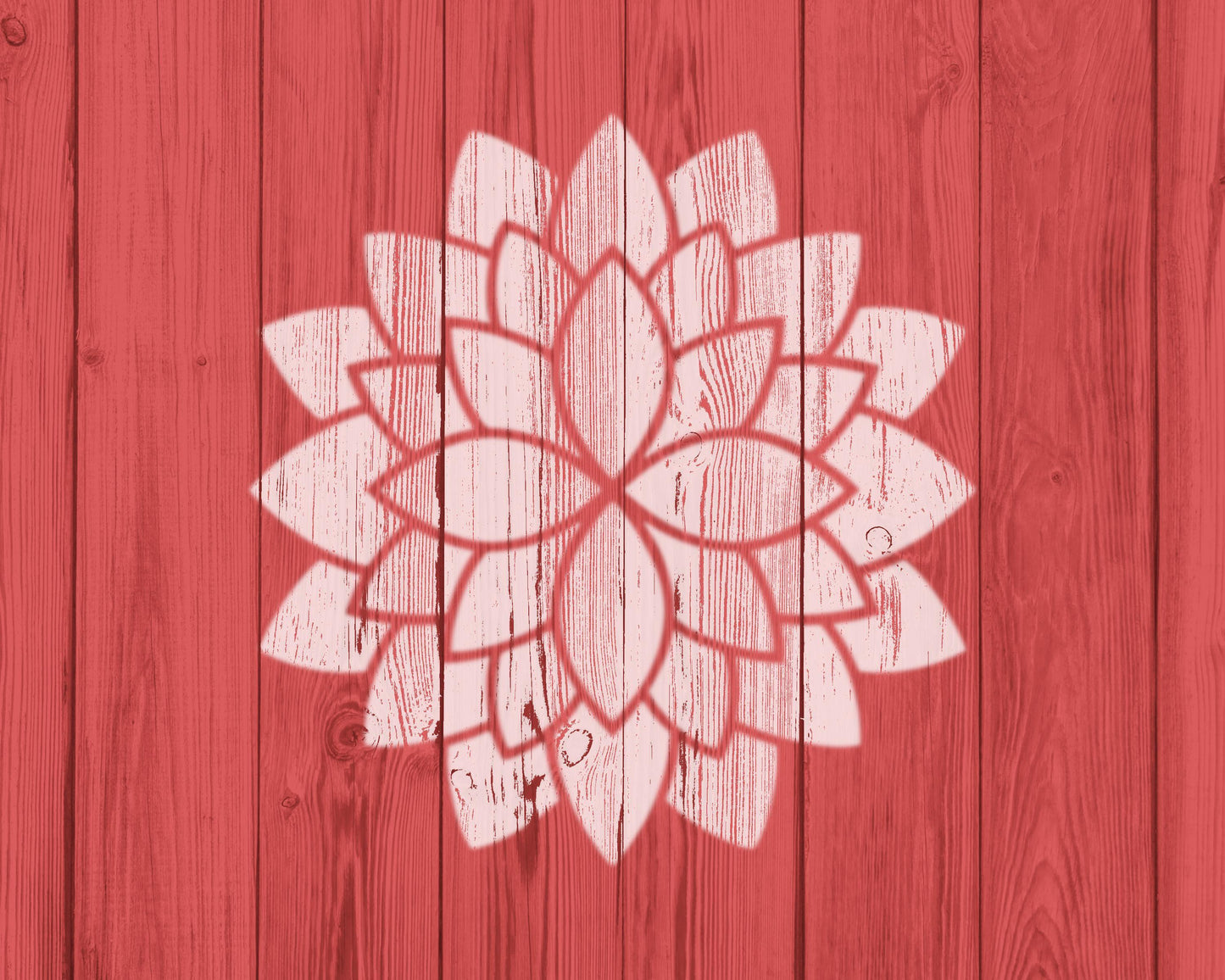 A white flower-like design is centered against a red wooden background.