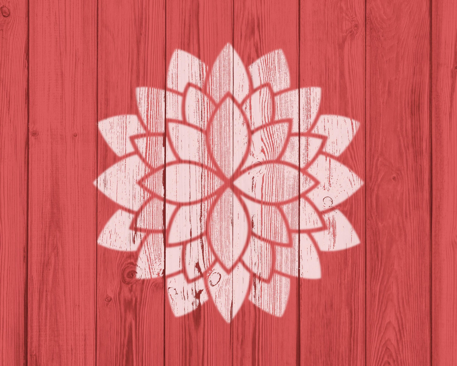 A white flower-like design is centered against a red wooden background.
