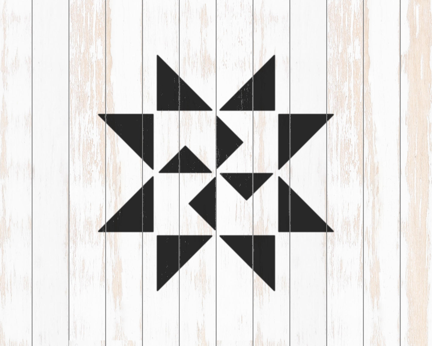 a black and white geometric design composed of various triangular shapes arranged in a symmetrical pattern.