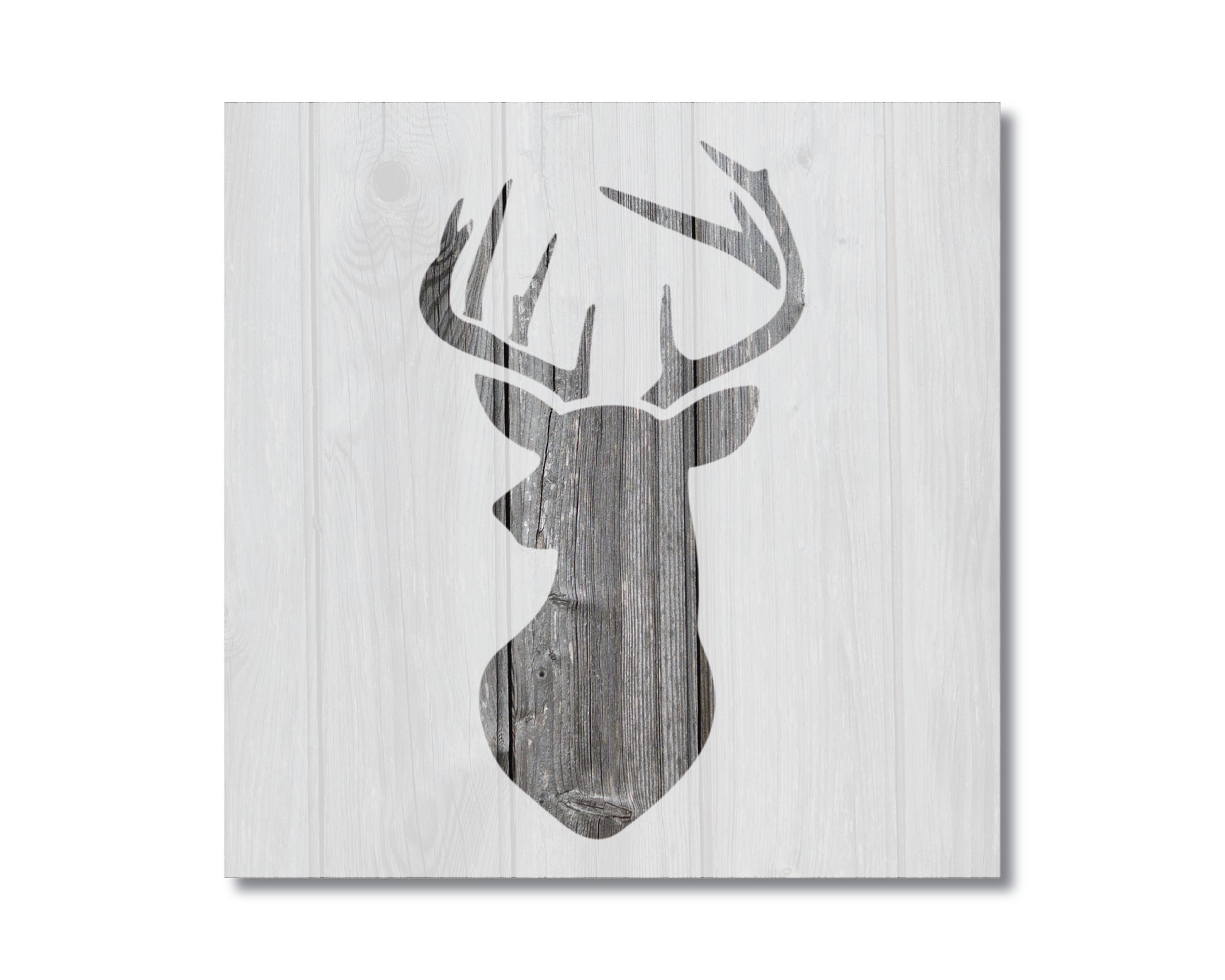 a wooden wall with a deer head on it