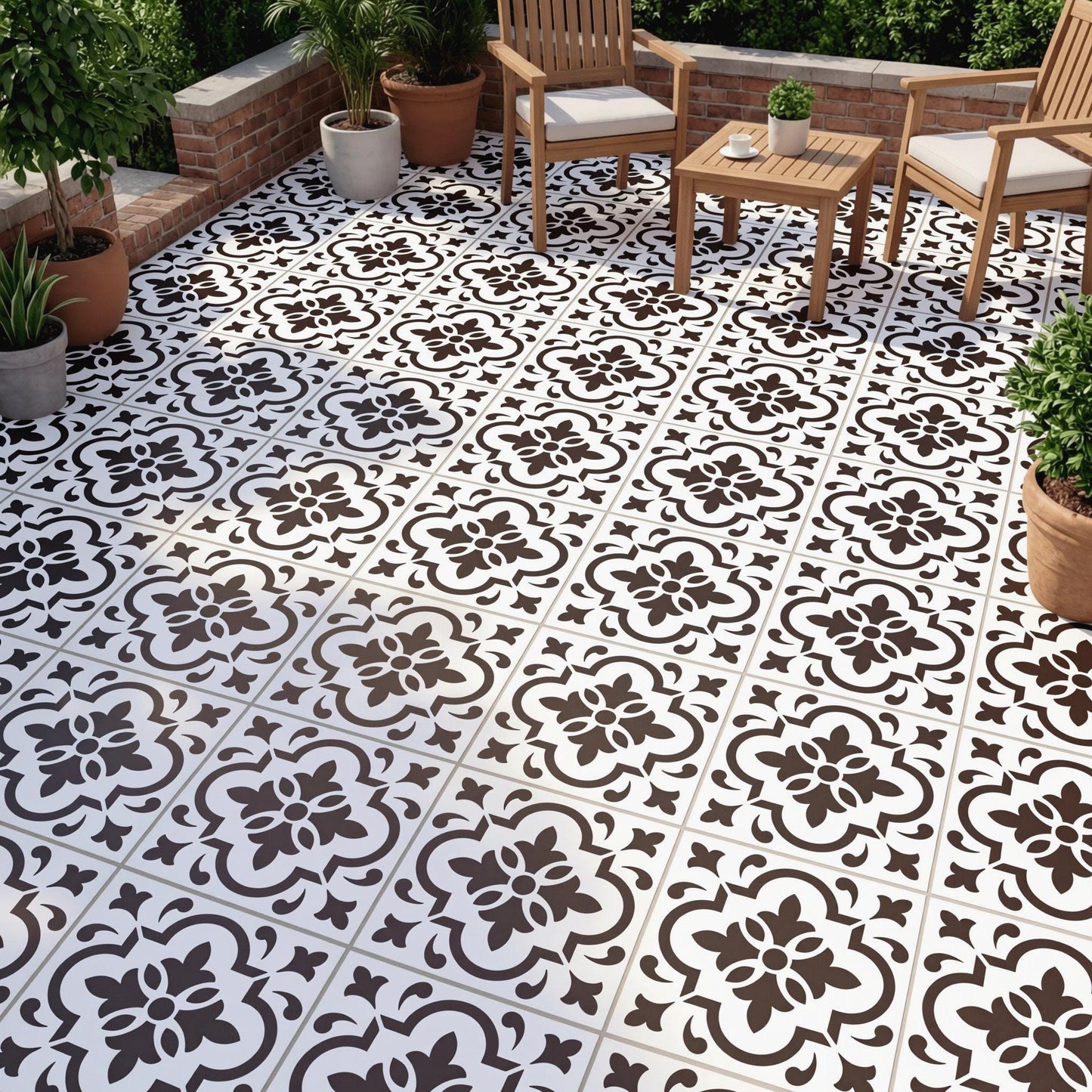a patio area with a black and white tile floor, a wooden table and chairs, and several potted plants surrounding the space.