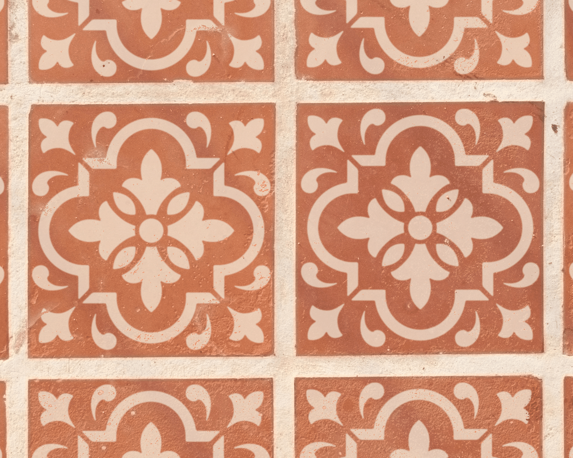 a repeating pattern of ornate, symmetrical designs in shades of brown and white. The pattern consists of a series of square tiles arranged in a grid-like fashion, with each tile showcasing a unique design. The tiles are arranged in a way that creates a visually striking and intricate pattern, with the use of color and design elements adding depth and complexity to the overall composition.