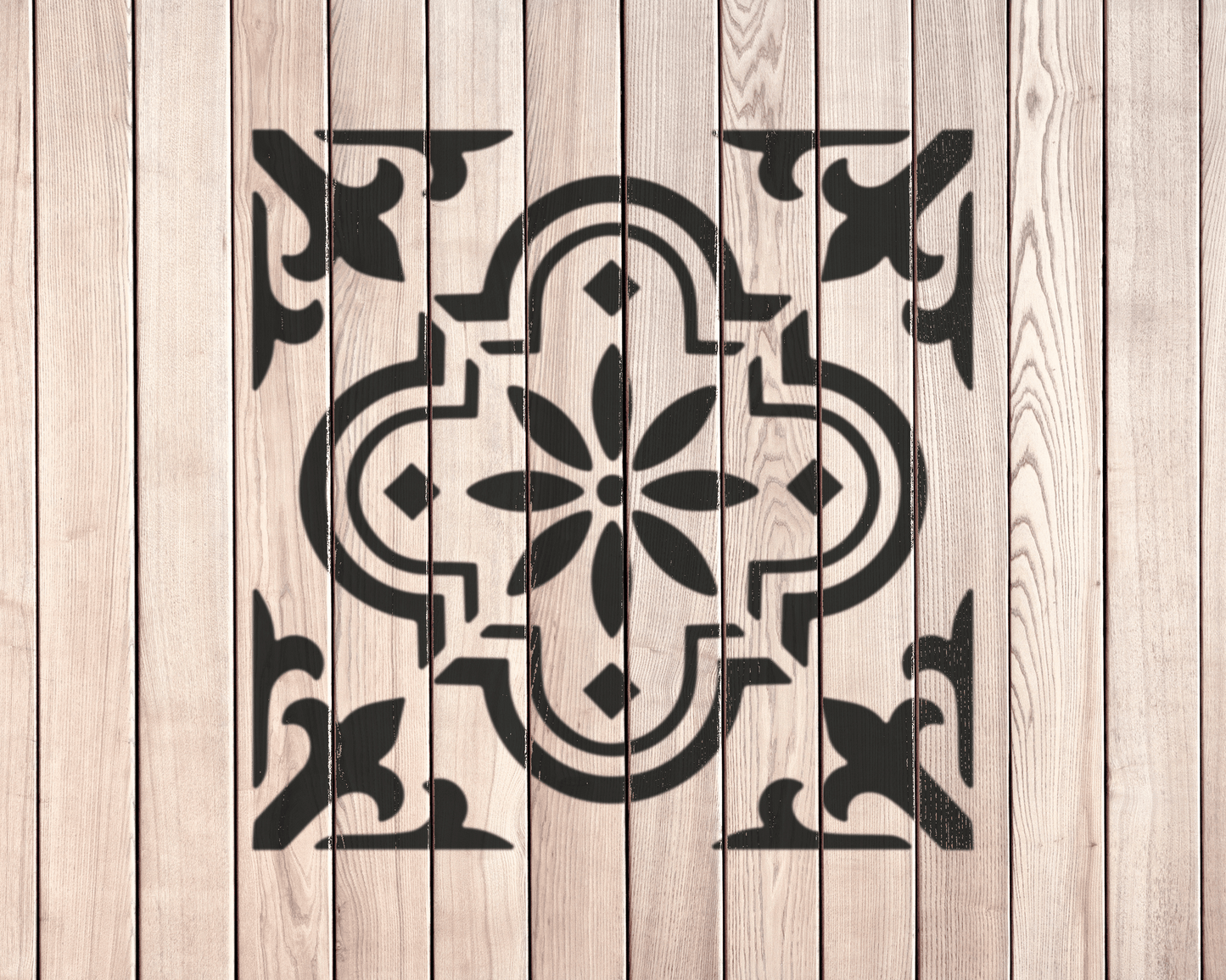 a wooden surface with a decorative black and white design in the center.