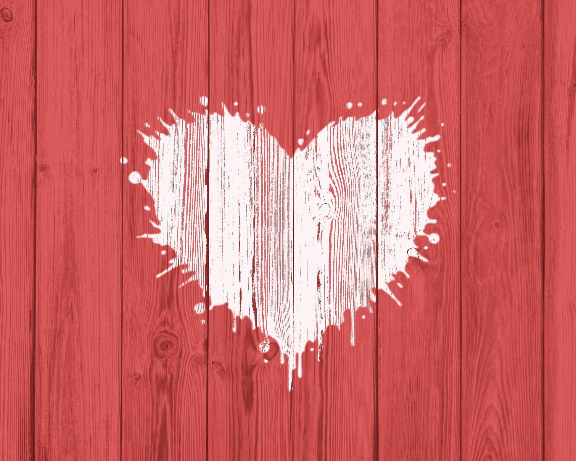 a heart shape painted on a red wooden background.
