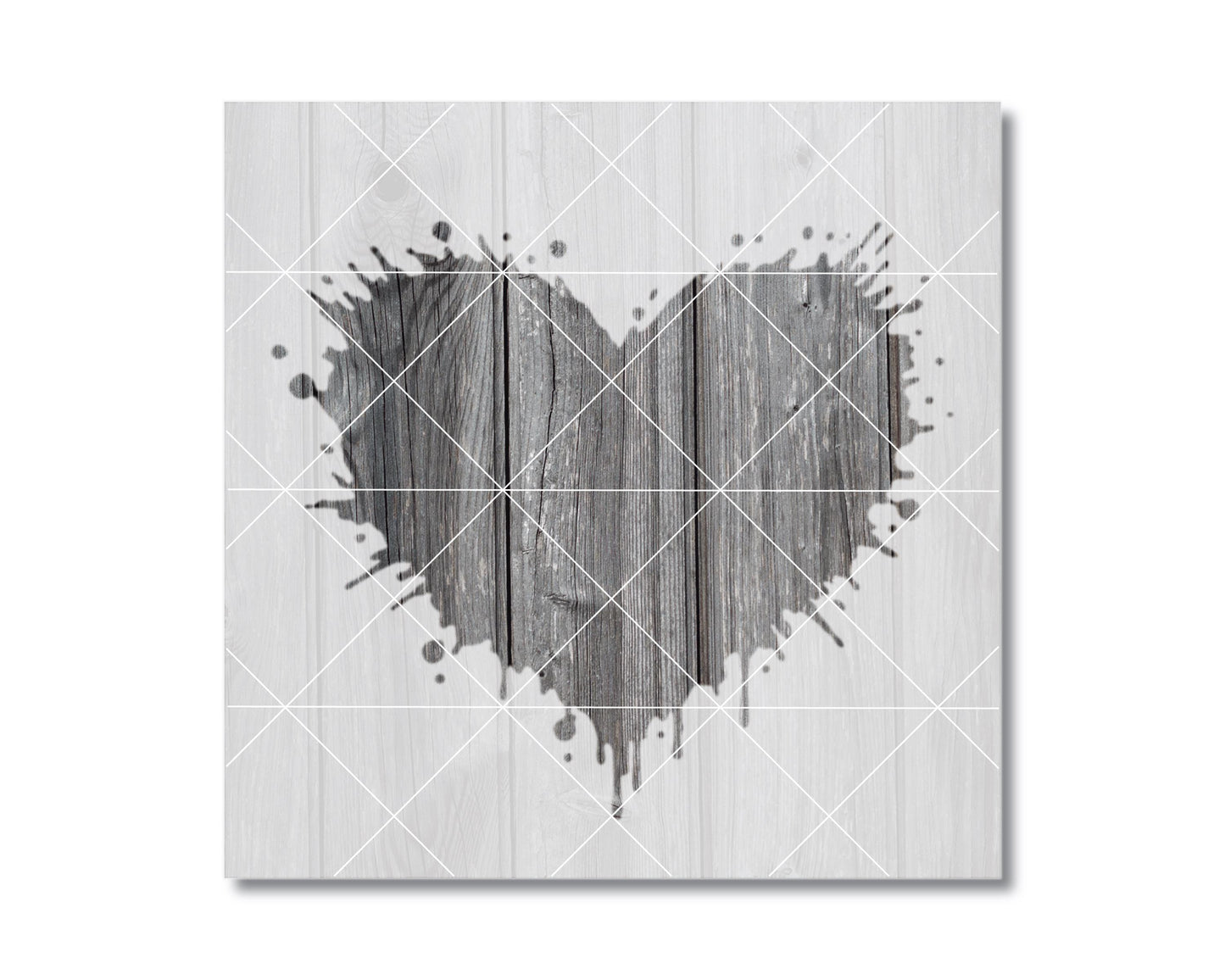 A heart-shaped design made of wooden planks, with splatters of paint or ink around it, creating a striking visual effect.