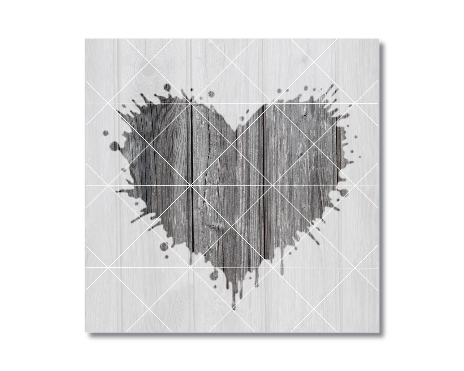 A heart-shaped design made of wooden planks, with splatters of paint or ink around it, creating a striking visual effect.