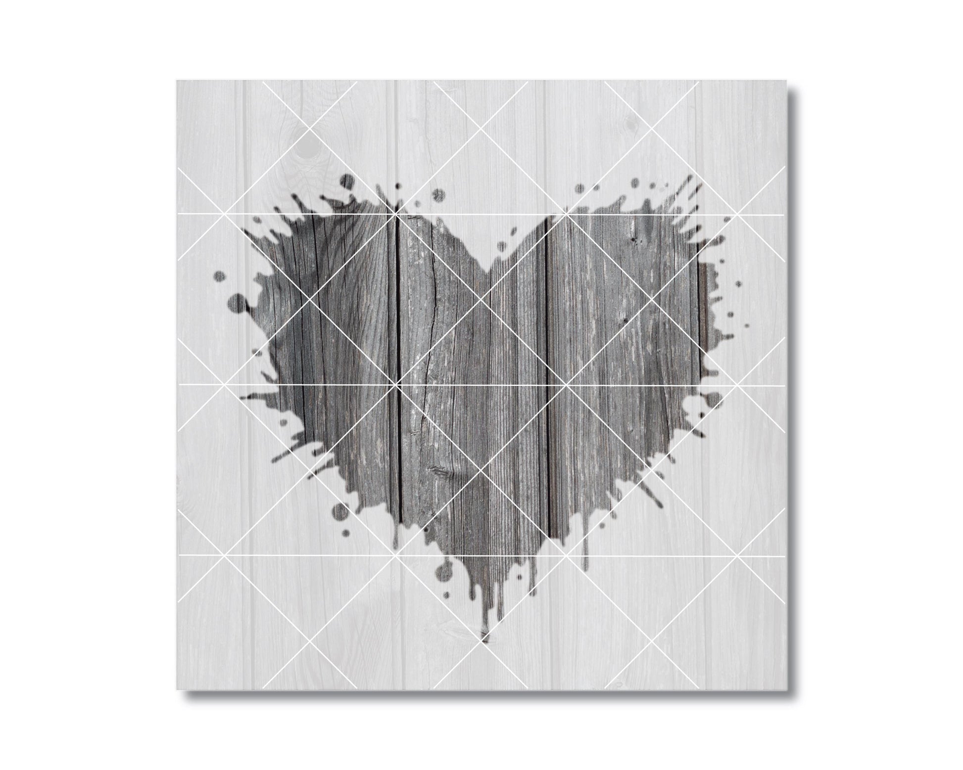 A heart-shaped design made of wooden planks, with splatters of paint or ink around it, creating a striking visual effect.