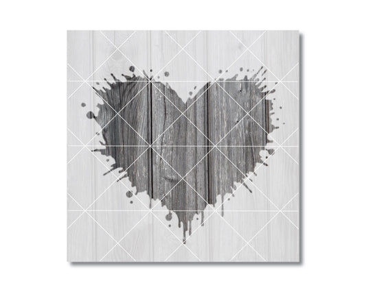 A heart-shaped design made of wooden planks, with splatters of paint or ink around it, creating a striking visual effect.