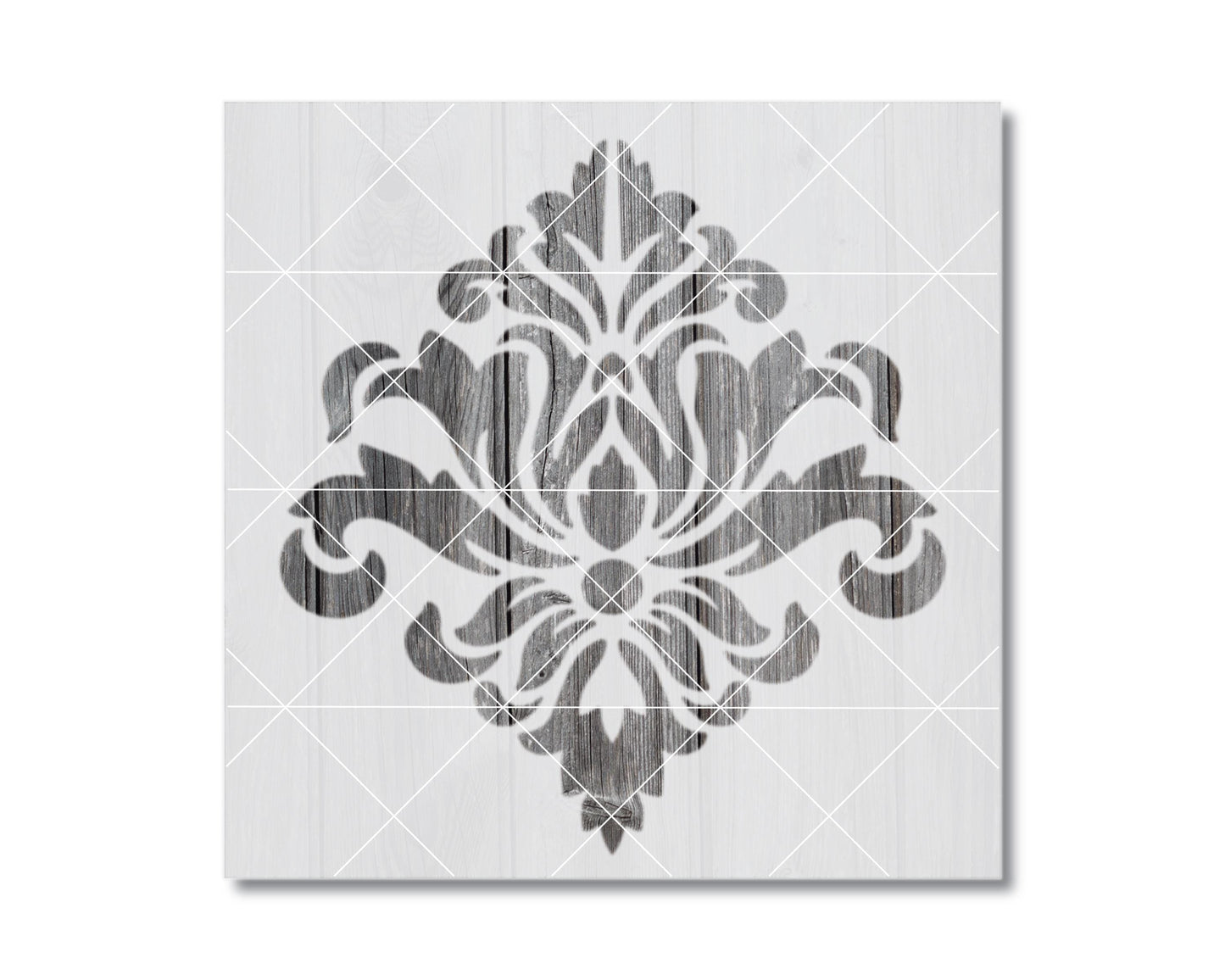 a decorative black and white design with a symmetrical pattern of floral or leaf-like shapes.