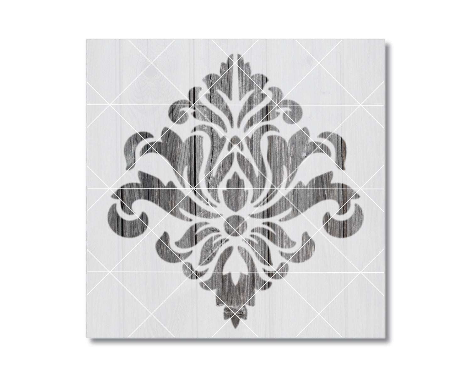 a decorative black and white design with a symmetrical pattern of floral or leaf-like shapes.