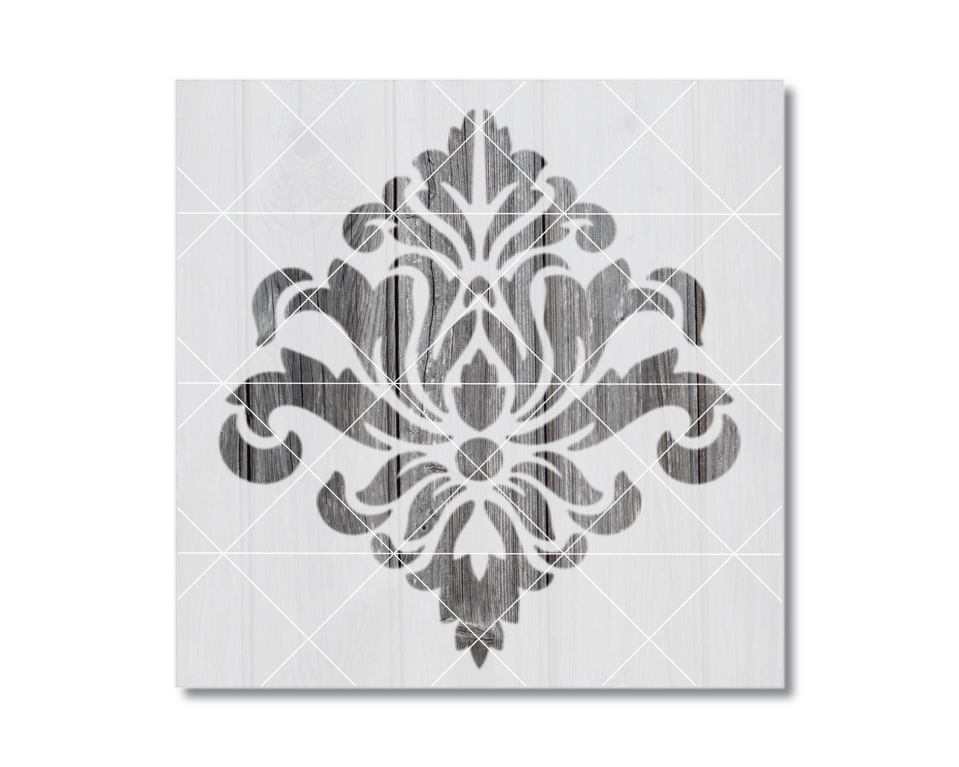 a decorative black and white design with a symmetrical pattern of floral or leaf-like shapes.