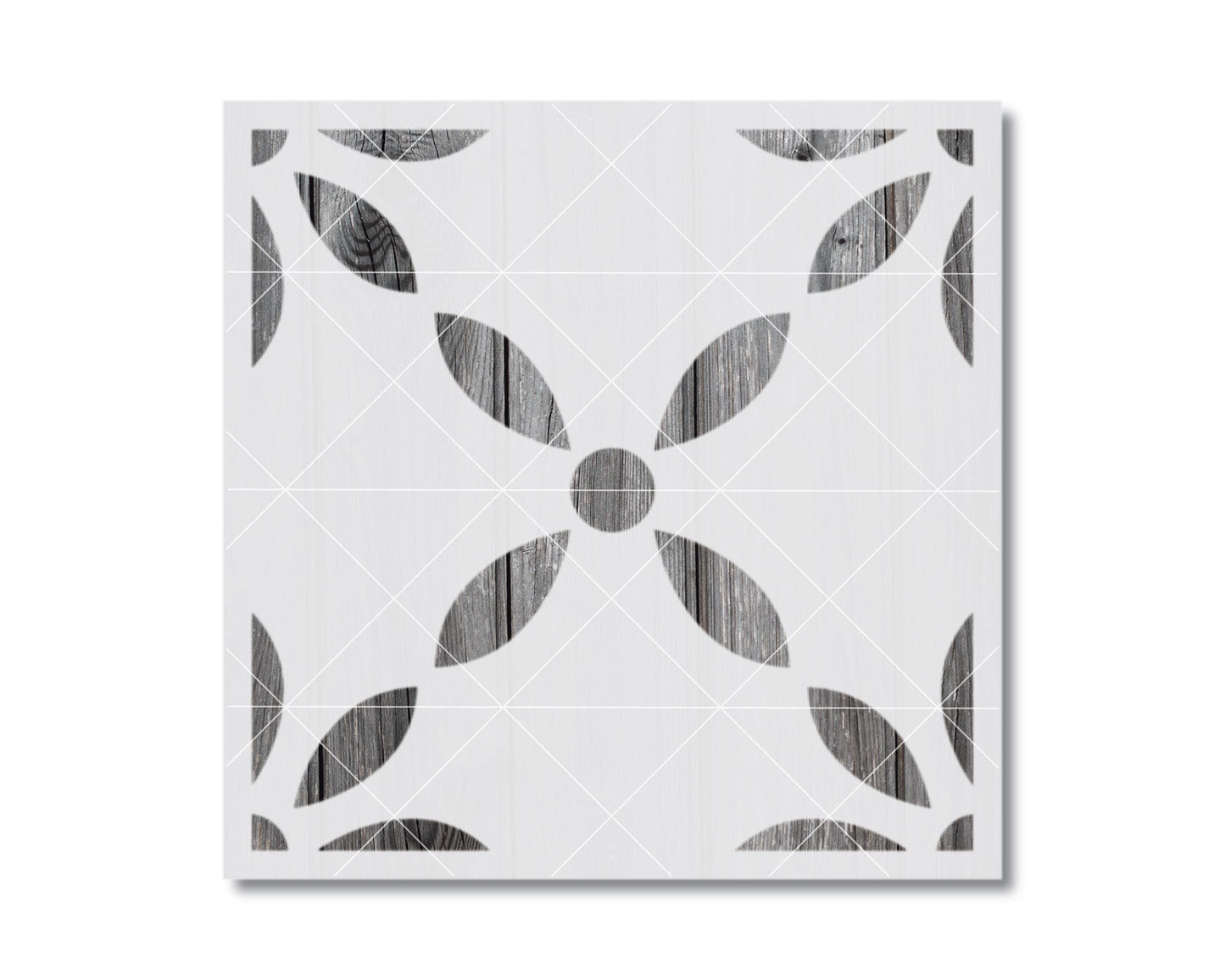 a square tile with a repeating pattern of black and white geometric shapes, including a flower-like design.