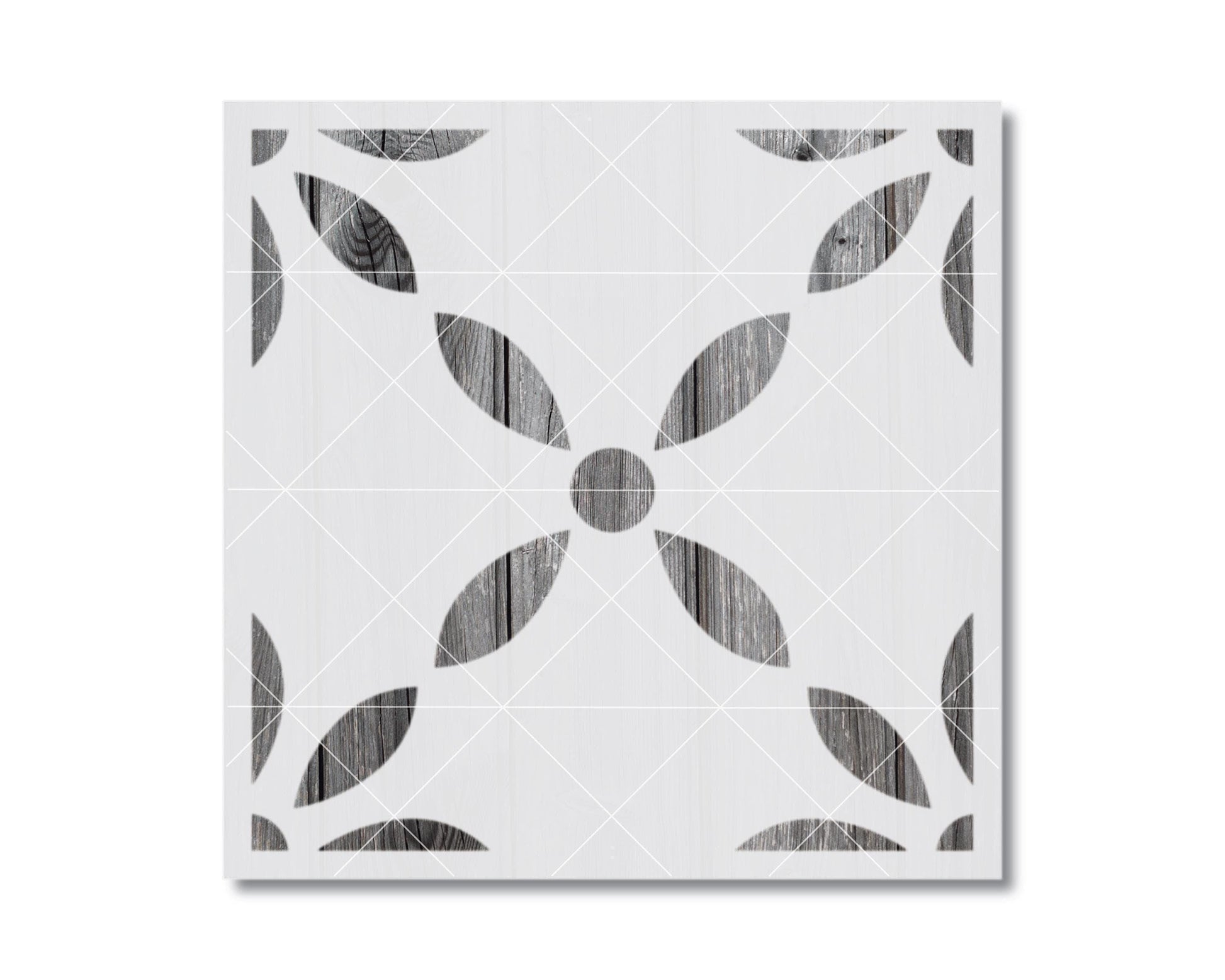 a square tile with a repeating pattern of black and white geometric shapes, including a flower-like design.