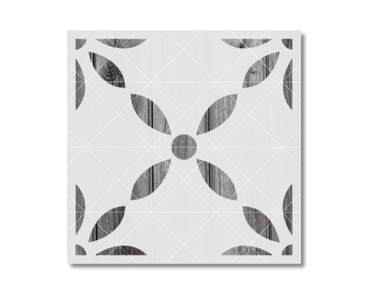 a square tile with a repeating pattern of black and white geometric shapes, including a flower-like design.