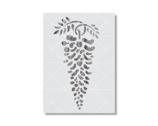 A stencil design featuring a stylized grape cluster or bunch of grapes, with a leaf-like element above it.