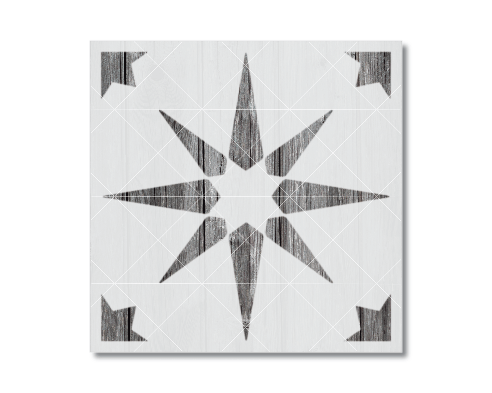 a square tile with a star-like design in black and white.