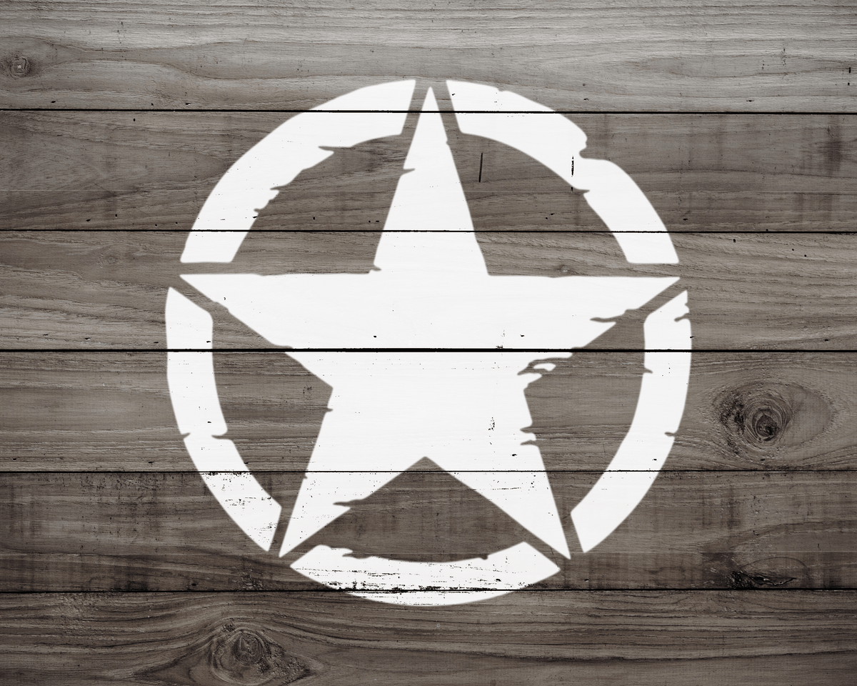 A white star-shaped symbol painted on a wooden surface.