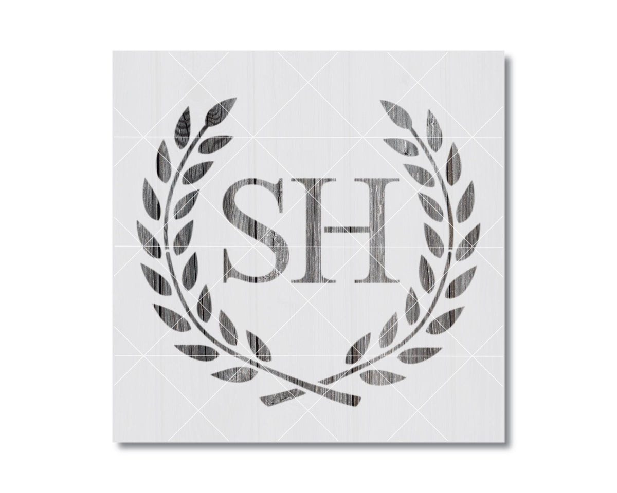 a monochromatic logo with a laurel wreath and the letters "SH" inside it.