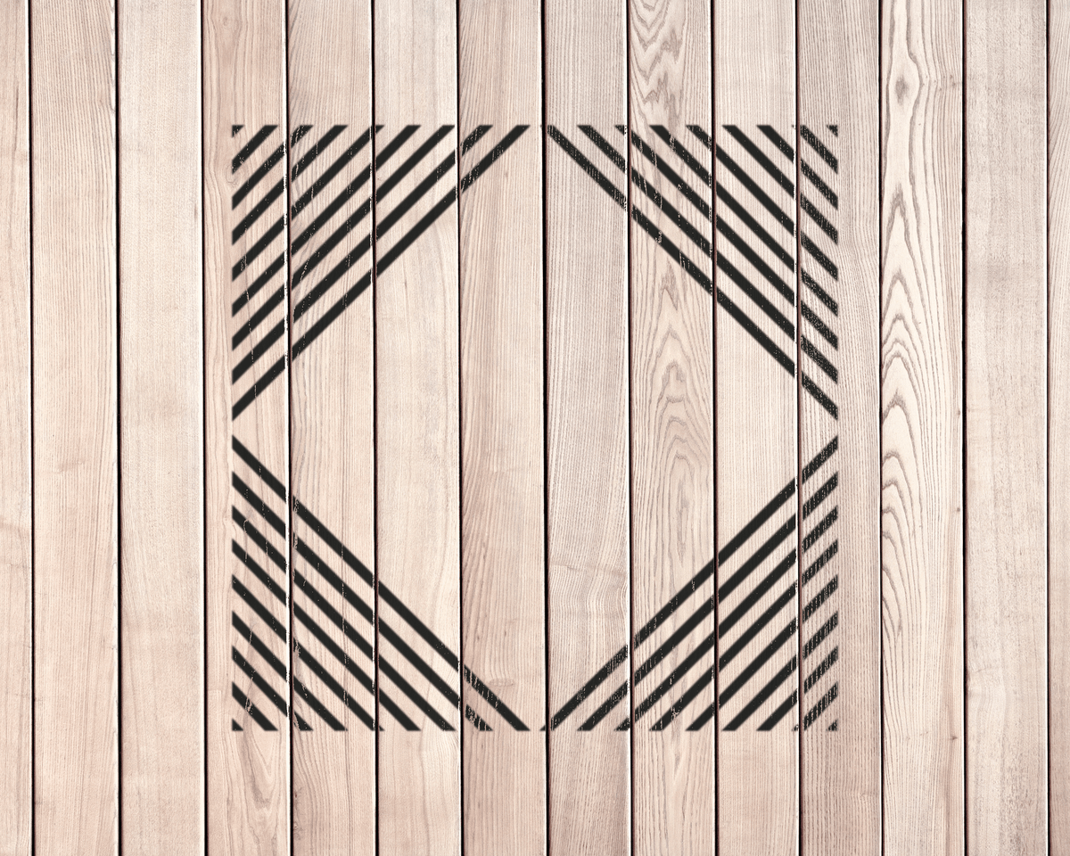 a wooden surface with a geometric pattern of diagonal lines, creating a visually striking design.