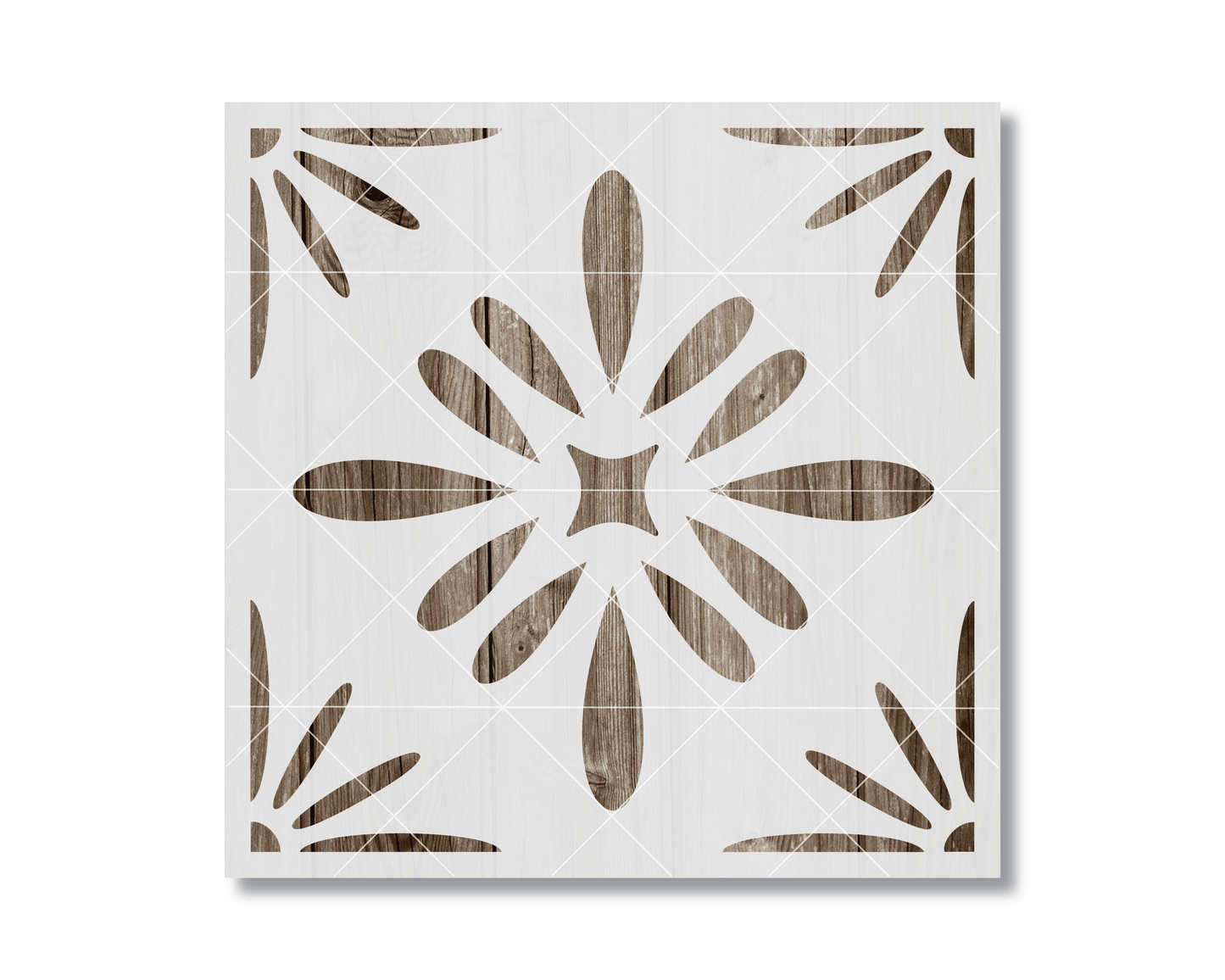 a square with a floral pattern made up of wooden shapes, including a star and leaves, arranged in a symmetrical design.