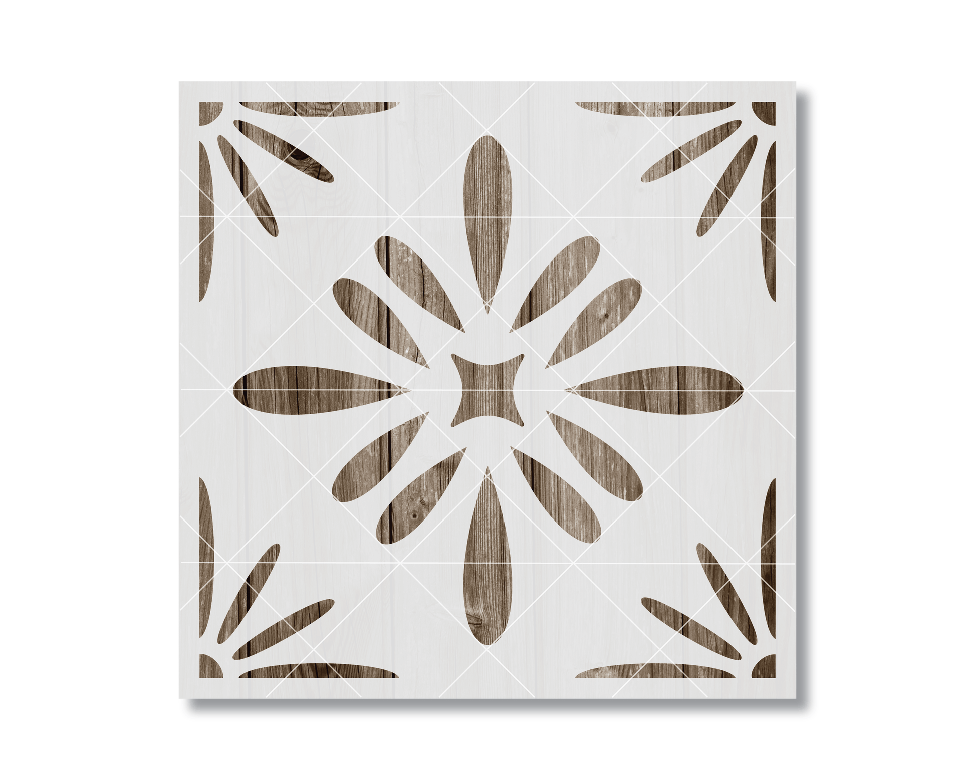 a square with a floral pattern made up of wooden shapes, including a star and leaves, arranged in a symmetrical design.