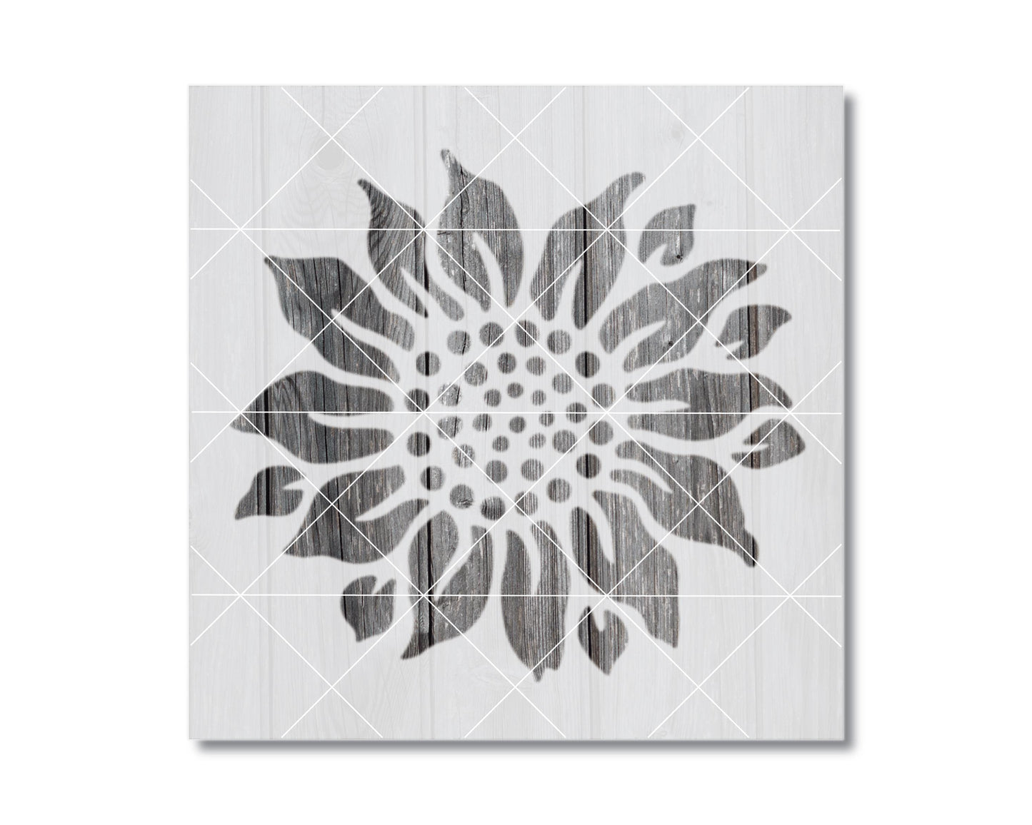 A black and white image of a stylized sunflower design on a white background.