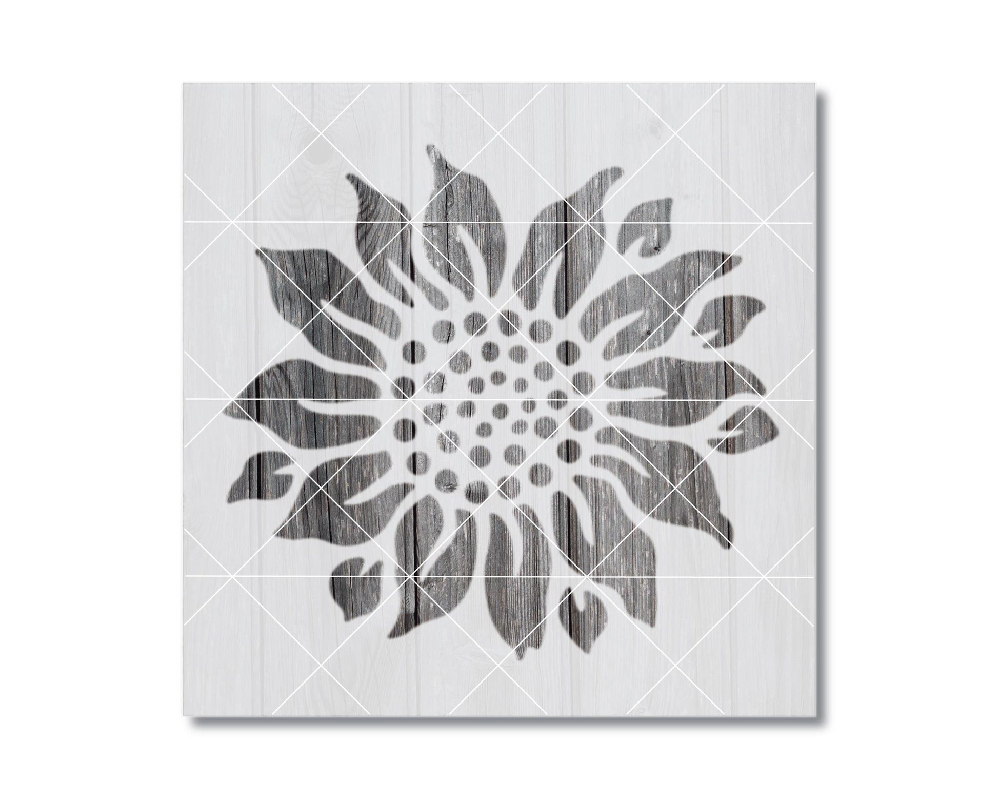 A black and white image of a stylized sunflower design on a white background.