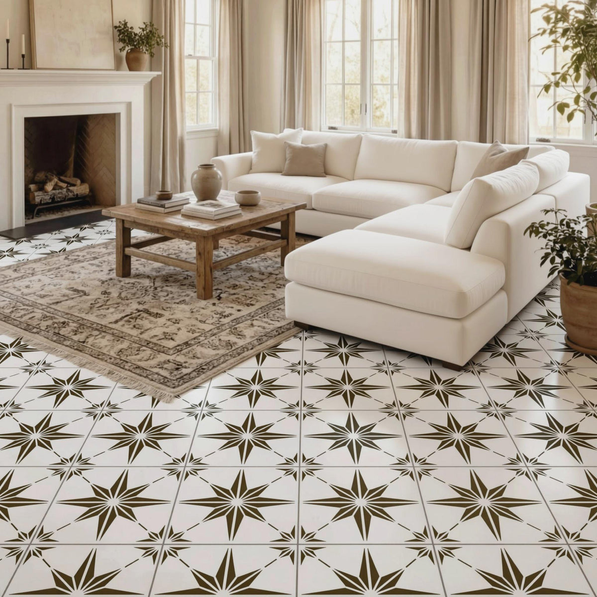 a cozy living room with a large white sectional sofa, a wooden coffee table, and a fireplace. The floor is covered in a black and white star-patterned tile design.