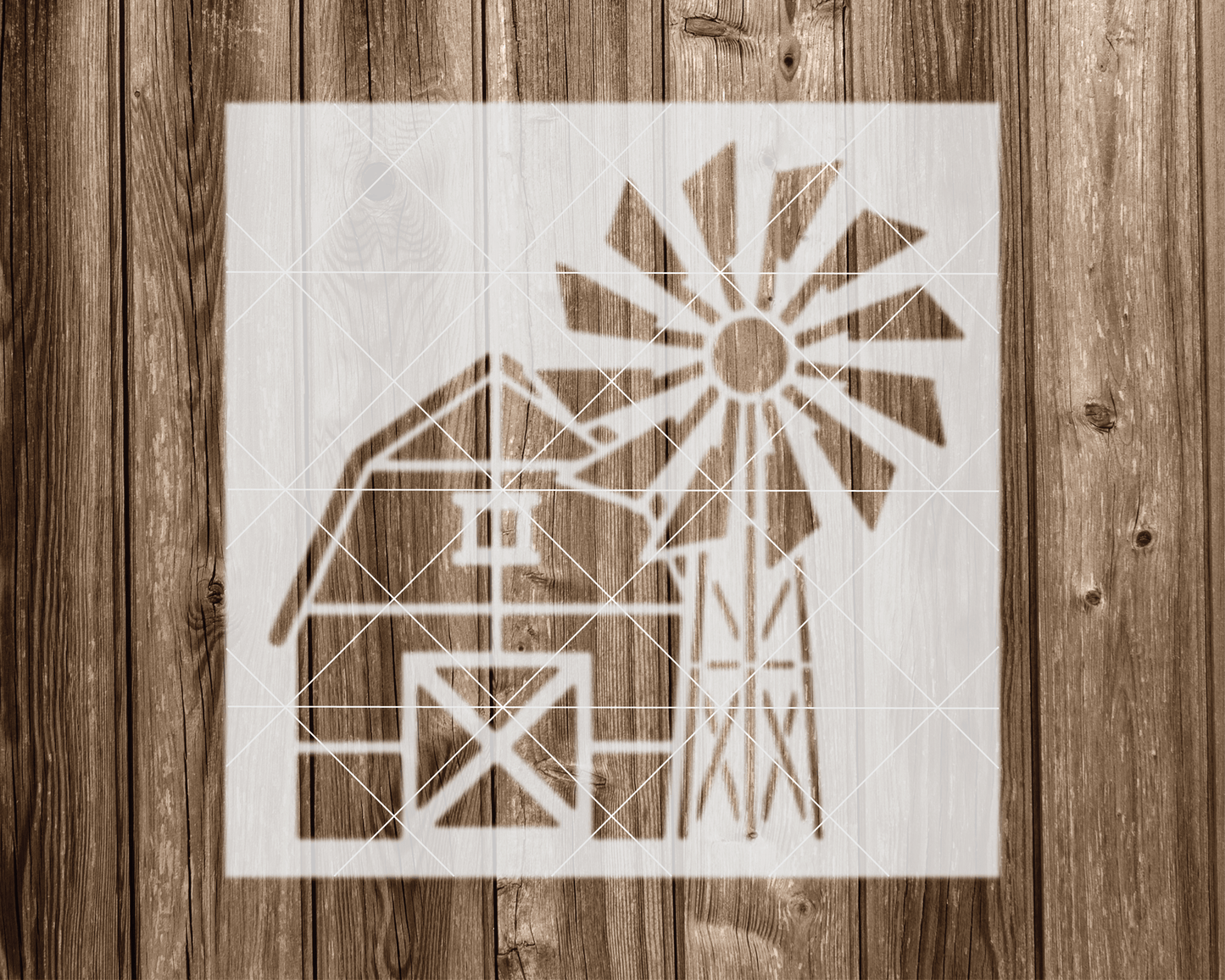 a picture of a barn with a windmill