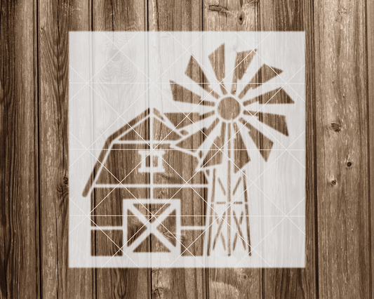 a picture of a barn with a windmill