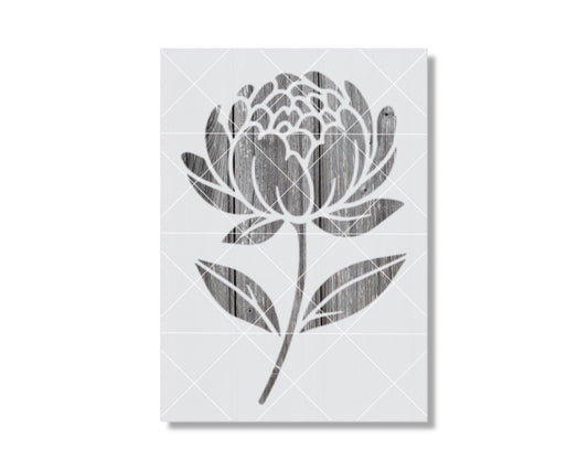 A black and white image depicting a stylized flower with a textured appearance.