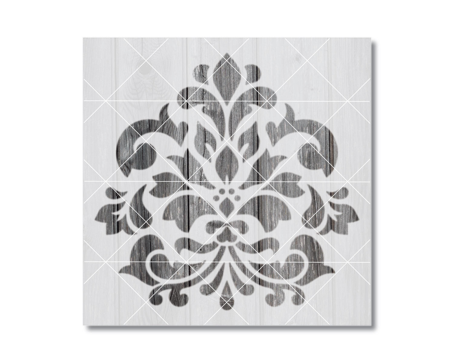 a square-shaped design with a repeating pattern of black and white floral and leaf-like shapes.