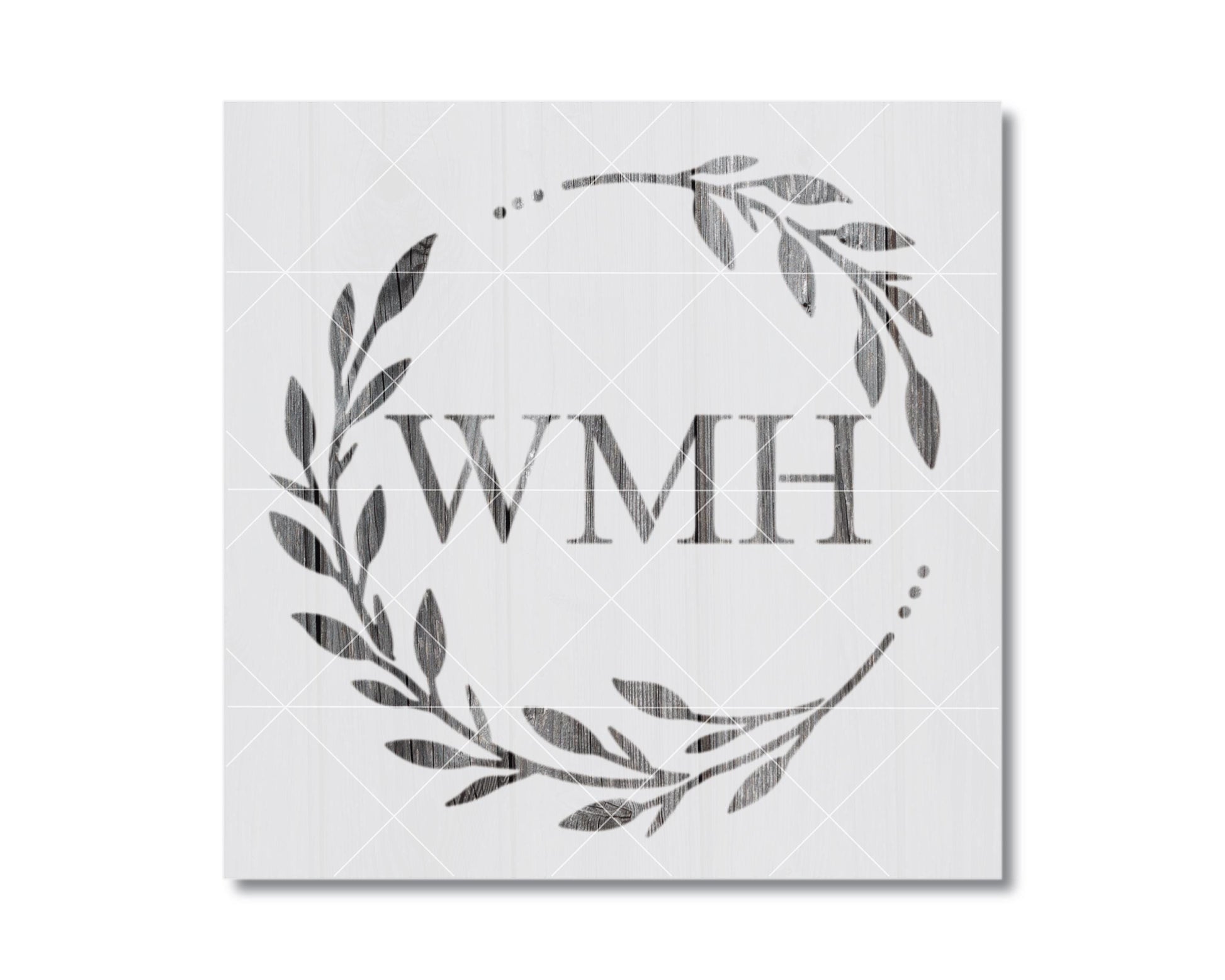 a wreath-like design with the letters "WMH" prominently displayed in the center.